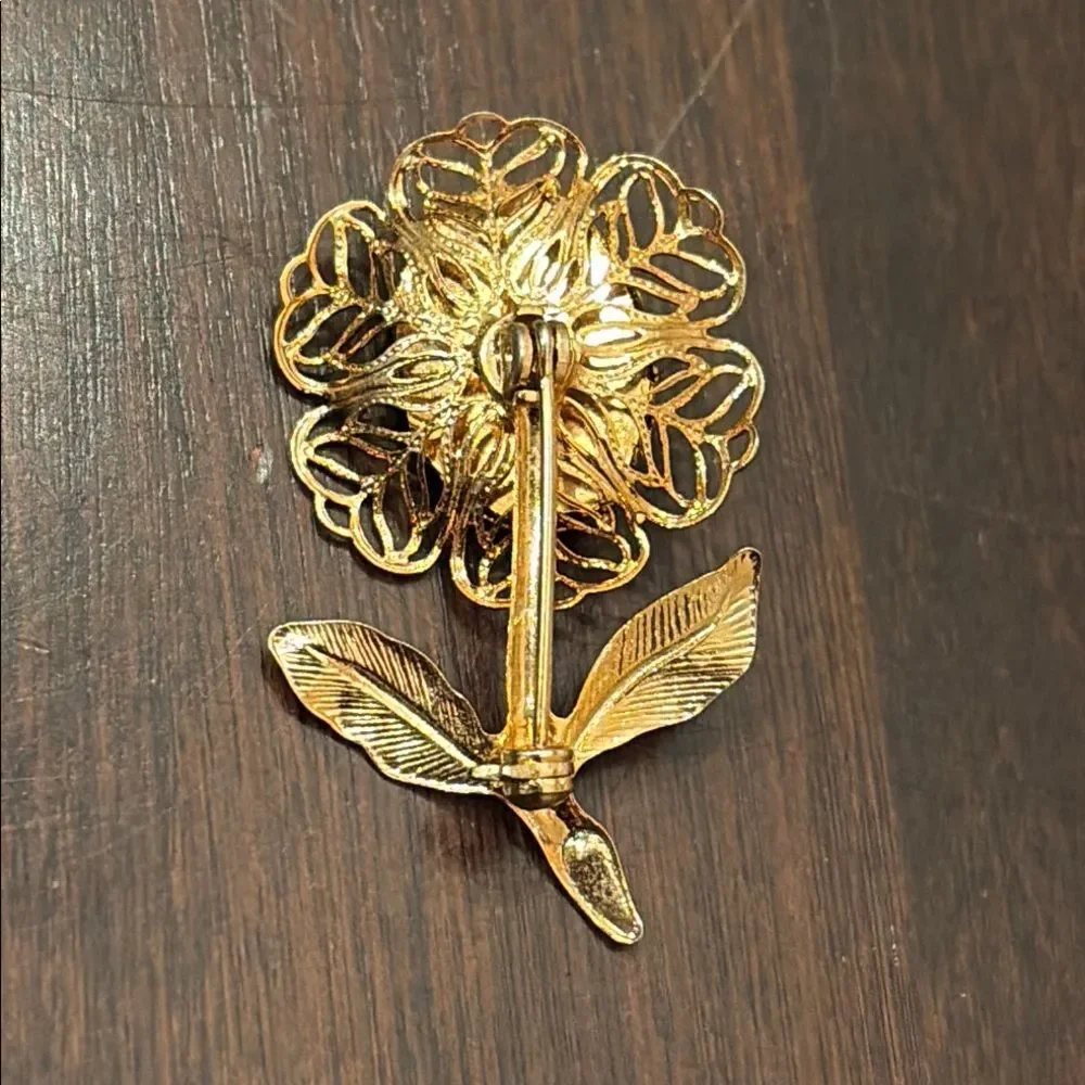 Intricate Gold and Black Flower Cameo Brooch